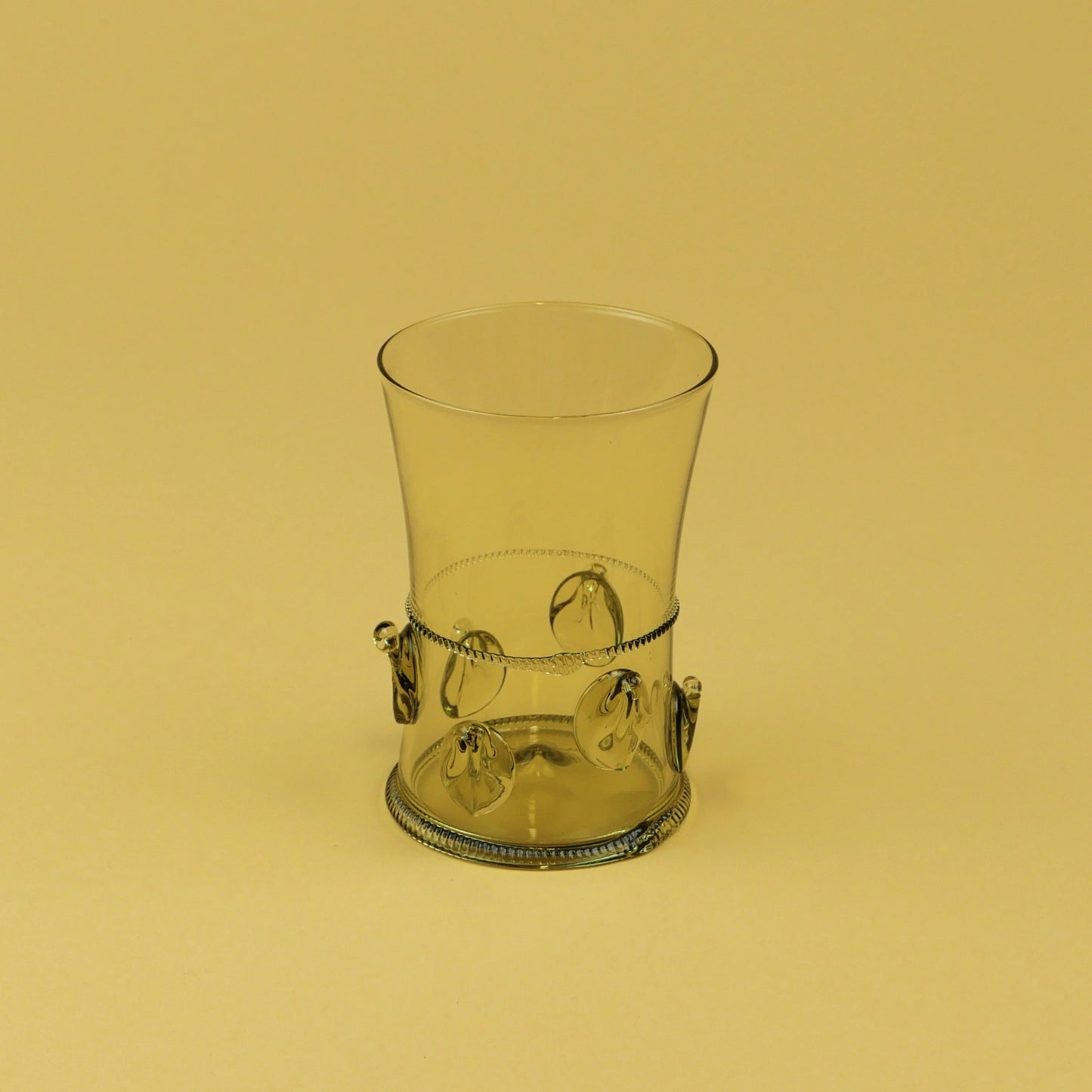 Water Droplets Tumble In The Moss Green Beverage Cup