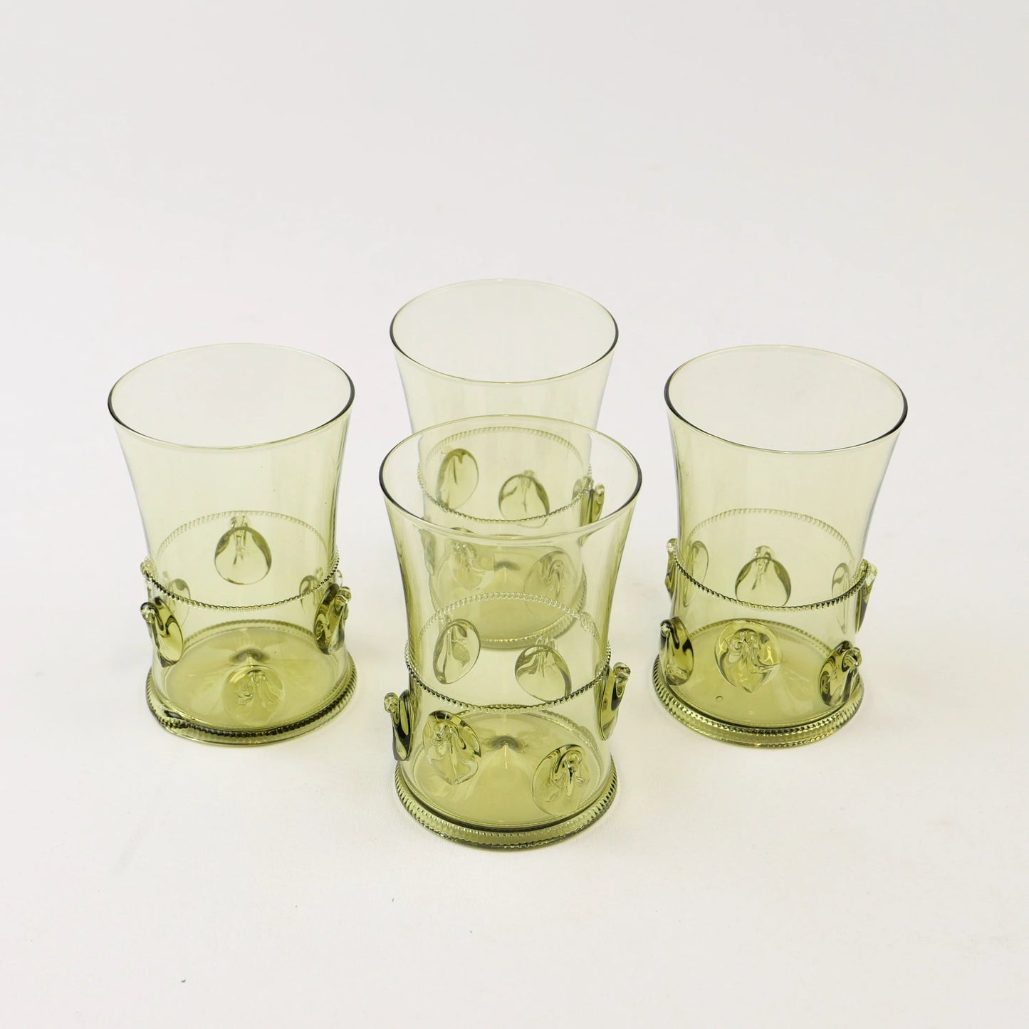 Water Droplets Tumble In The Moss Green Beverage Cup